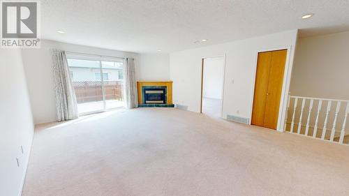 10108 108 Avenue, Fort St. John, BC - Indoor Photo Showing Living Room With Fireplace