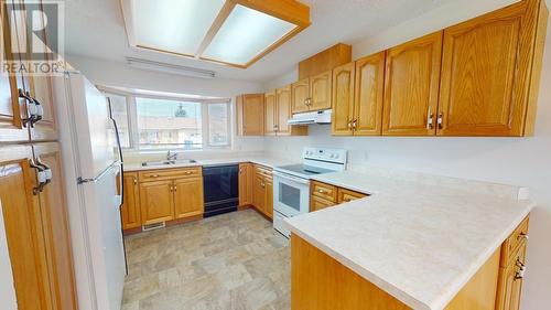 10108 108 Avenue, Fort St. John, BC - Indoor Photo Showing Kitchen With Double Sink