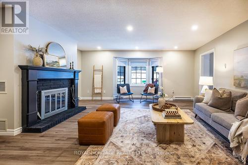 4 - 605 Whitaker Street, Peterborough, ON - Indoor Photo Showing Living Room With Fireplace