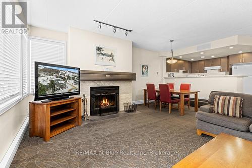 103 - 107 Ann Heggtveit Drive, Blue Mountains (Blue Mountain Resort Area), ON - Indoor Photo Showing Living Room With Fireplace