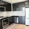 1322 - 30 Shore Breeze Drive N, Toronto, ON  - Indoor Photo Showing Kitchen With Upgraded Kitchen 