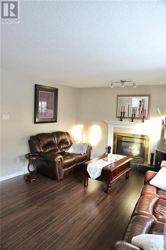 741 Adamson Crescent, Shellbrook, SK - Indoor Photo Showing Living Room With Fireplace