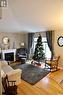 741 Adamson Crescent, Shellbrook, SK  - Indoor Photo Showing Living Room With Fireplace 