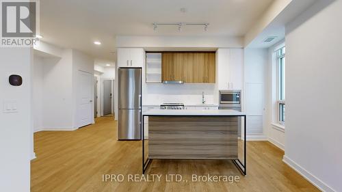 3007 - 30 Upper Mall Way, Vaughan, ON - Indoor Photo Showing Kitchen With Stainless Steel Kitchen