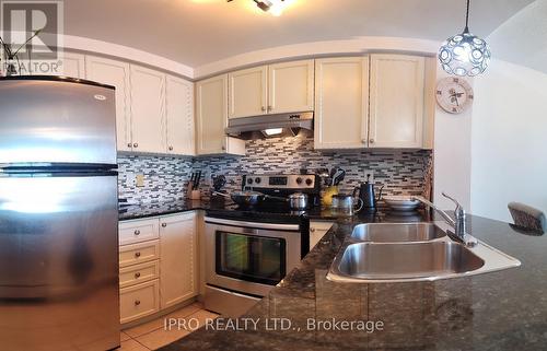 603 - 9 George Street N, Brampton, ON - Indoor Photo Showing Kitchen With Double Sink