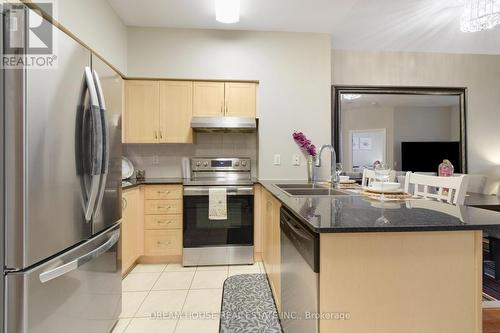 114 - 50 Disera Drive, Vaughan, ON - Indoor Photo Showing Kitchen With Double Sink