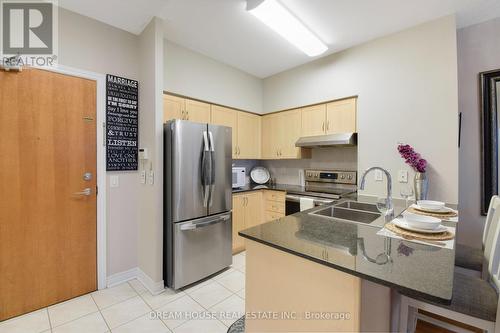 114 - 50 Disera Drive, Vaughan, ON - Indoor Photo Showing Kitchen With Double Sink