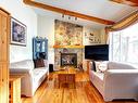 Salon - 3373 Rue Donald, Laval (Fabreville), QC  - Indoor Photo Showing Living Room With Fireplace 