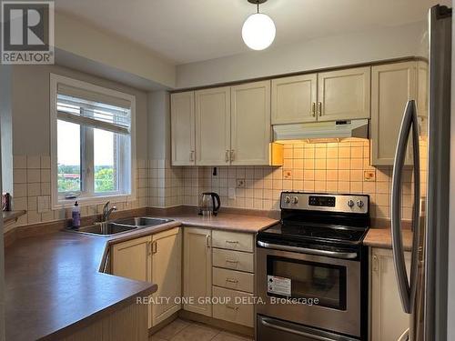 63D View Green Crescent, Toronto, ON - Indoor Photo Showing Kitchen With Double Sink