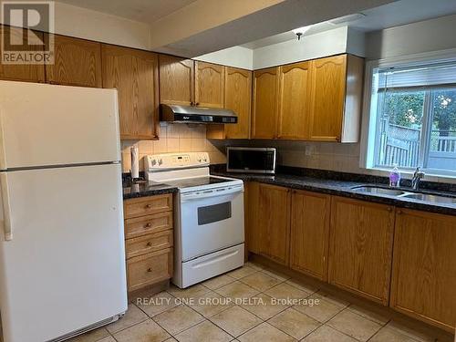 63D View Green Crescent, Toronto, ON - Indoor Photo Showing Kitchen With Double Sink