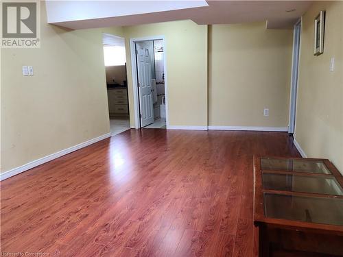 Spare room featuring wood-type flooring - 12 Peer Drive Unit# Basement, Guelph, ON - Indoor Photo Showing Other Room