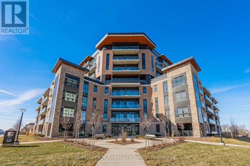 205 - 332 Gosling Gardens, Guelph (Guelph South), ON - Outdoor With Balcony With Facade