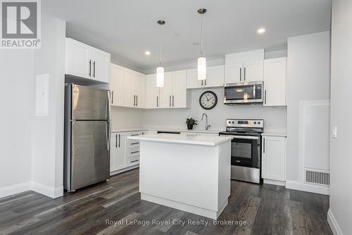 205 - 332 Gosling Gardens, Guelph (Guelph South), ON - Indoor Photo Showing Kitchen With Stainless Steel Kitchen