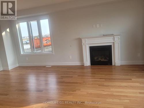 107 Butler Boulevard N, Kawartha Lakes, ON - Indoor Photo Showing Living Room With Fireplace