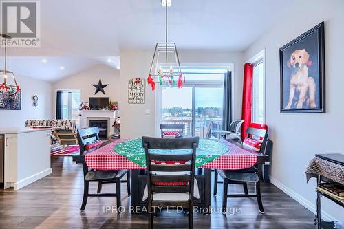 111 Renaissance Drive, St. Thomas, ON - Indoor Photo Showing Dining Room With Fireplace