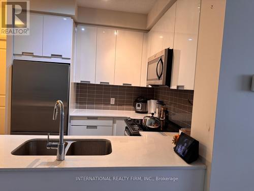 1109 - 5025 Four Springs Avenue, Mississauga, ON - Indoor Photo Showing Kitchen With Double Sink