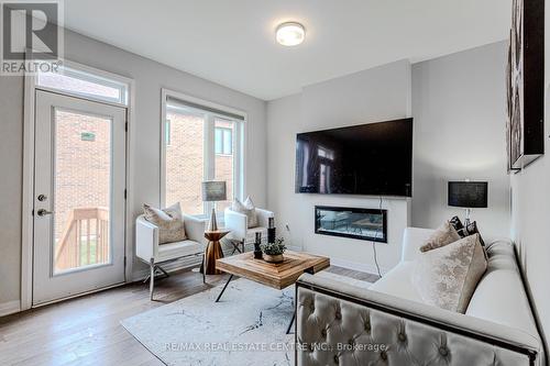 64 Settlers Road E, Oakville, ON - Indoor Photo Showing Living Room With Fireplace