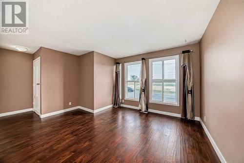 LIVING AREA 1 - 112 Falwood Crescent Ne, Calgary, AB - Indoor Photo Showing Other Room