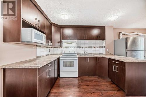 112 Falwood Crescent Ne, Calgary, AB - Indoor Photo Showing Kitchen