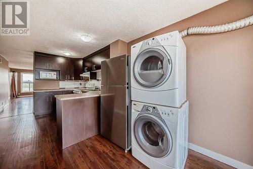 laundry area main level - 112 Falwood Crescent Ne, Calgary, AB - Indoor Photo Showing Laundry Room