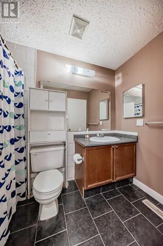 MAIN LEVEL BATHROOM - 112 Falwood Crescent Ne, Calgary, AB - Indoor Photo Showing Bathroom