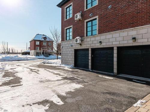 Garage - 423 Boul. Des Cépages, Laval (Duvernay), QC - Outdoor With Exterior