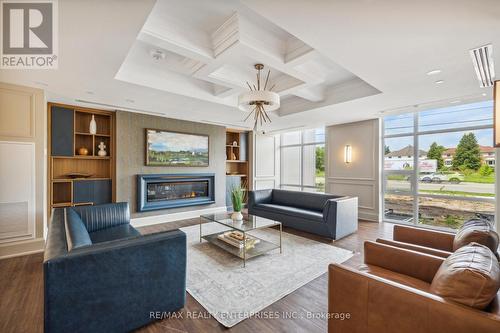 806 - 450 Dundas Street E, Hamilton, ON - Indoor Photo Showing Living Room With Fireplace