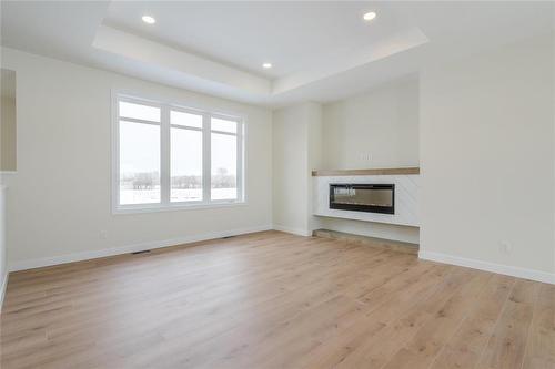 48 Harry Waytiuk Drive, East Selkirk, MB - Indoor Photo Showing Living Room With Fireplace