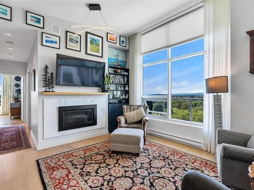 802-4009 Rainbow Hill Lane, Saanich, BC - Indoor Photo Showing Living Room With Fireplace