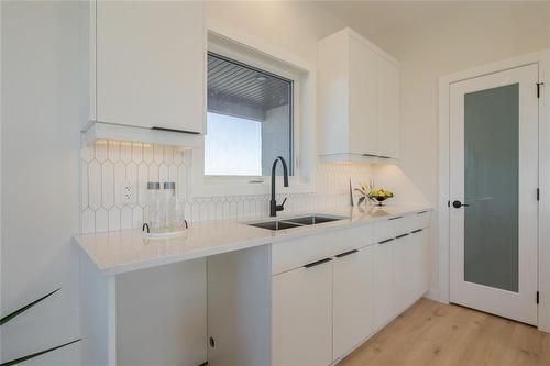 81 Wild Plum Lane, Steinbach, MB - Indoor Photo Showing Kitchen With Double Sink