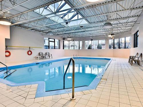 Piscine - 102-999 Rue White, Montréal (Saint-Laurent), QC - Indoor Photo Showing Other Room With In Ground Pool