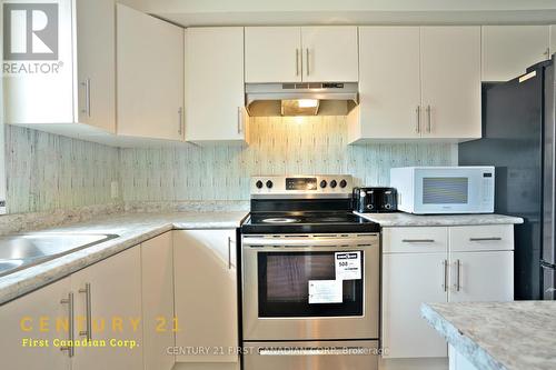 67 - 7768 Ascot Circle, Niagara Falls (213 - Ascot), ON - Indoor Photo Showing Kitchen