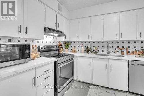 1412 - 3380 Eglinton Avenue E, Toronto, ON - Indoor Photo Showing Kitchen