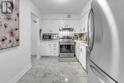 1412 - 3380 Eglinton Avenue E, Toronto, ON - Indoor Photo Showing Kitchen