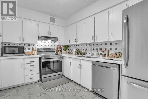 1412 - 3380 Eglinton Avenue E, Toronto, ON - Indoor Photo Showing Kitchen