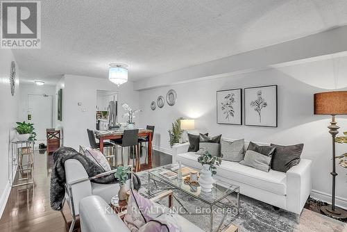 1412 - 3380 Eglinton Avenue E, Toronto, ON - Indoor Photo Showing Living Room