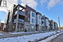 212 - 2388 Khalsa Gate, Oakville, ON  - Outdoor With Balcony With Facade 