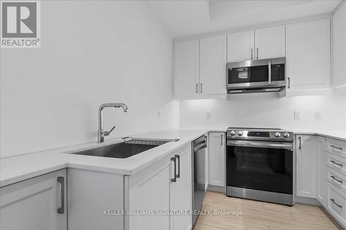 216 - 1 Hume Street, Collingwood, ON - Indoor Photo Showing Kitchen With Stainless Steel Kitchen With Upgraded Kitchen