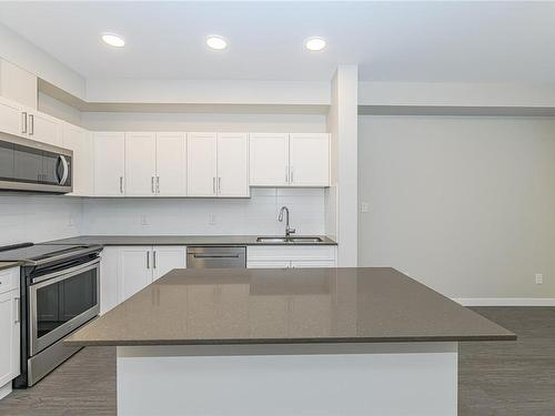 401-2843 Jacklin Rd, Langford, BC - Indoor Photo Showing Kitchen With Double Sink