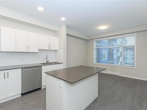 401-2843 Jacklin Rd, Langford, BC - Indoor Photo Showing Kitchen With Double Sink