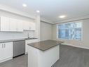 401-2843 Jacklin Rd, Langford, BC  - Indoor Photo Showing Kitchen With Double Sink 