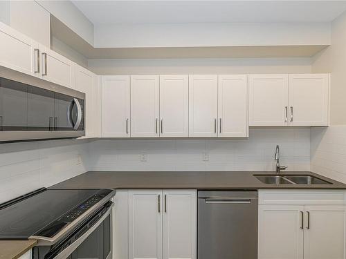 401-2843 Jacklin Rd, Langford, BC - Indoor Photo Showing Kitchen With Double Sink