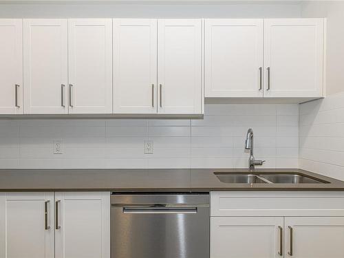 401-2843 Jacklin Rd, Langford, BC - Indoor Photo Showing Kitchen With Double Sink