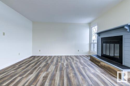 #14 4610 17 Av Nw, Edmonton, AB - Indoor With Fireplace