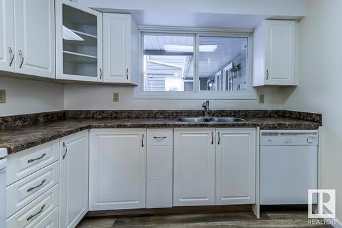 #14 4610 17 Av Nw, Edmonton, AB - Indoor Photo Showing Kitchen With Double Sink