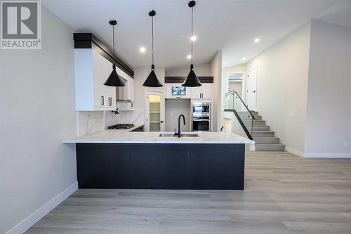 13013 104B Street, Grande Prairie, AB - Indoor Photo Showing Kitchen With Upgraded Kitchen