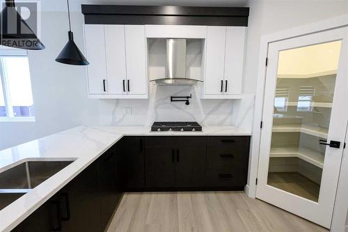 13013 104B Street, Grande Prairie, AB - Indoor Photo Showing Kitchen With Double Sink