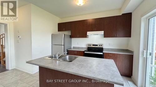 28 Sandhill  Crane Drive, Wasaga Beach, ON - Indoor Photo Showing Kitchen With Double Sink