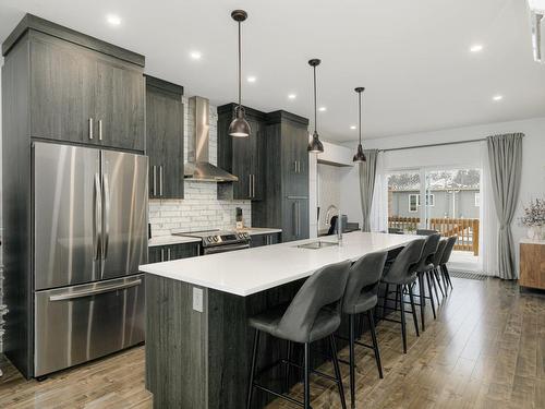 Kitchen - 8815  - 8817 Rue M.-J.-Drapeau, Mirabel, QC - Indoor Photo Showing Kitchen With Upgraded Kitchen