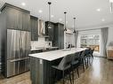 Kitchen - 8815  - 8817 Rue M.-J.-Drapeau, Mirabel, QC  - Indoor Photo Showing Kitchen With Upgraded Kitchen 